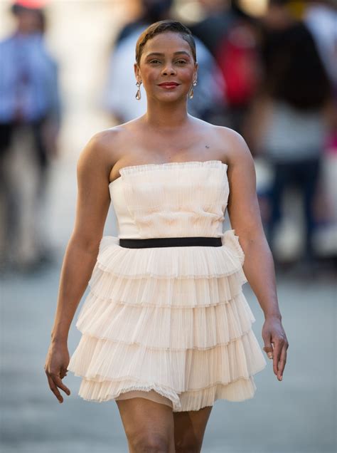 (simile, colloquial) very happy (sometimes with the extra connotations of being carefree or unaware of grimmer realities. Lark Voorhies defends new husband over legal issues ...
