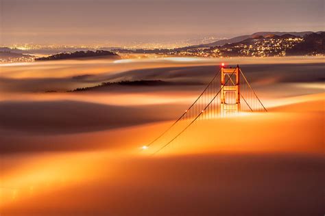 Golden Gate Bridge Covered By Low Fog Photograph By Jennie Jiang