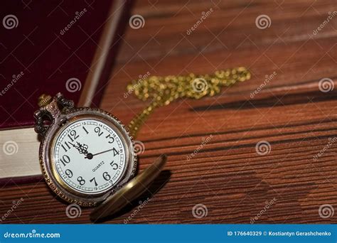 A Pocket Watch With Book Background Stock Image Image Of Elegant