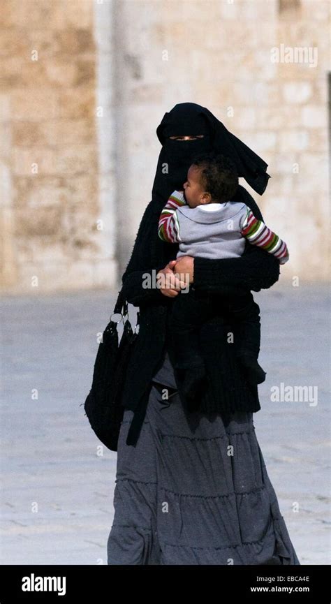 A Veiled Arab Woman With Her Baby On The Temple Mount In Jerusalem