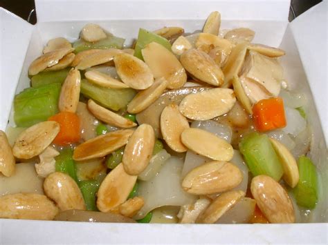 Add chicken stock, corn starch liquid, chinese wine and soy sauce in the broth pot. almond chicken chow yuk | Yelp