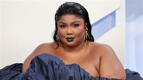 lizzo says body shaming comments on social media should cost money—watch the video glamour