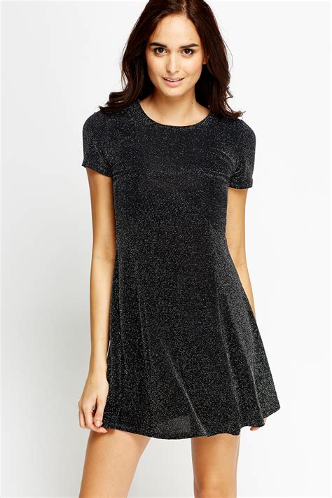 Be it metallic details like metallic foils engrained in the dress or a full metallic look. Metallic Short Sleeves Skater Dress - Just $7