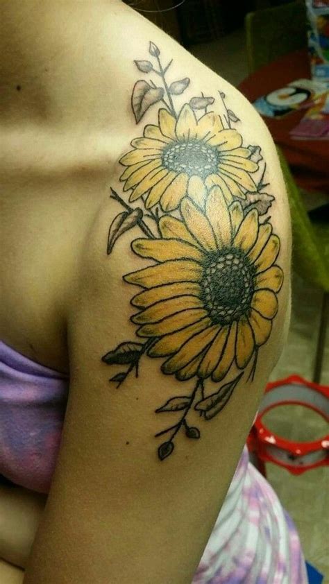 Deep pinks and greens draw the eye, and the shading makes the artwork more impressive. Sunflower Shoulder Tattoo Designs, Ideas and Meaning ...