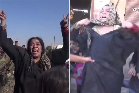 delighted woman rips off her black burqa to reveal leopard print outfit after she s saved from