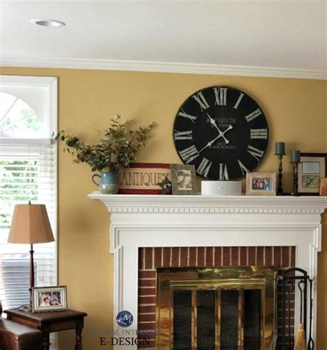 Sherwin Williams Restrained Gold Paint Color Red Brick Fireplace