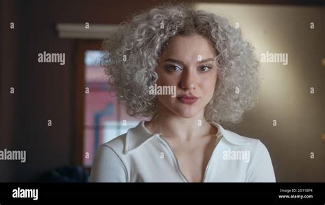 Portrait Of Attractive Curly White Hair Woman Stock Photo Alamy