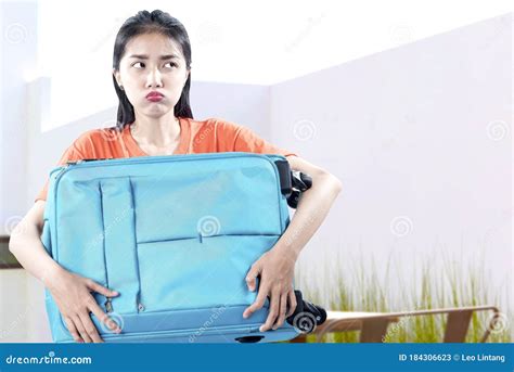 Asian Woman Carrying A Suitcase Stock Image Image Of Pretty Female 184306623