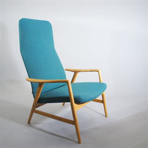 This chair is upholstered in a brown two tone marble color vinyl fabric. Vintage Swedish Contour Lounge Chair by Alf Svensson for ...