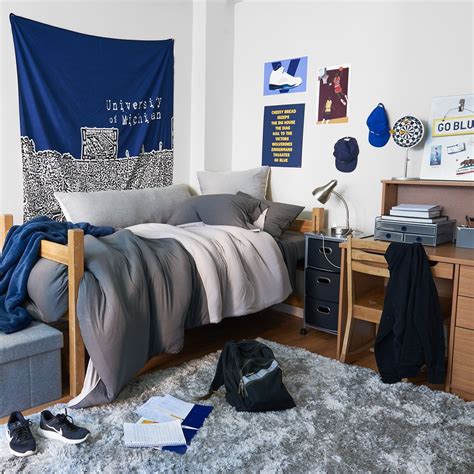 Bedding using masculine colors and patterns. Room Ideas for Guys - Guys Dorm Room Ideas | Dormify | Cool dorm rooms