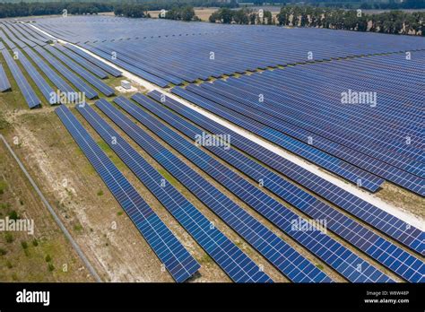 Aerial View Of Large Solar Panel Farm In Northern Florida Providing