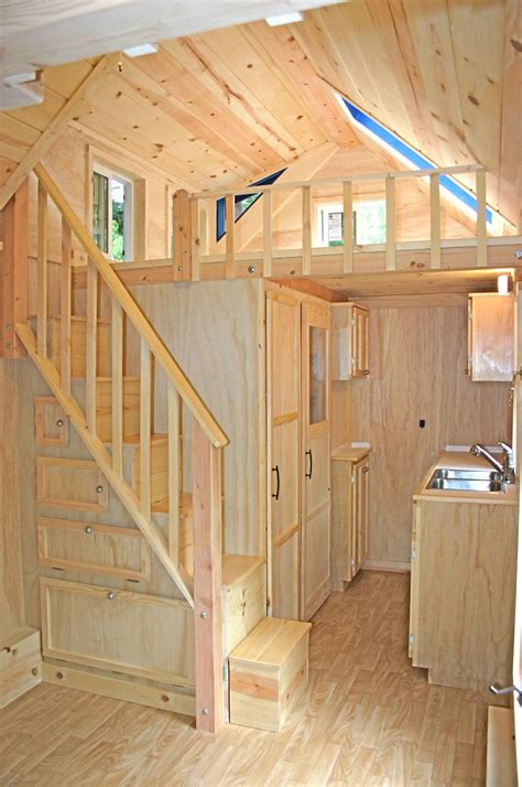 The loft has a small opening window that adds ambiance and is just right for that little investigator in your family. Molecule Tiny Homes