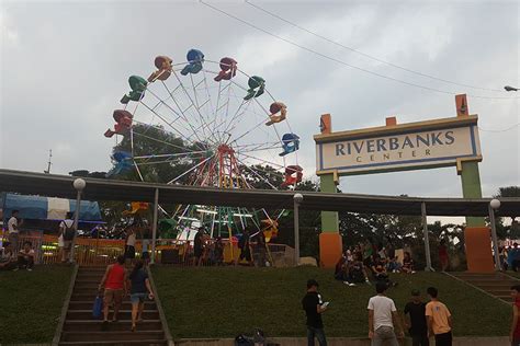 A statue of a mermaid riding on top of a foot bridge connecting both banks and you could see sm marikina mall on the other side. PICTURES: Stroll Around Marikina Riverbanks Center (River ...