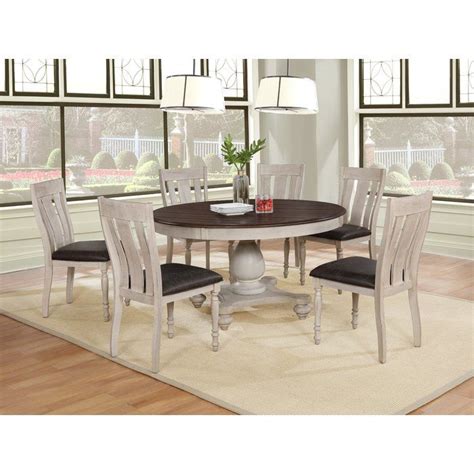 This stunning dining set is similar to a timeless missionary design and adds an elegant, modern touch to any kitchen area or dining room. Mixon 7 Piece Solid Wood Dining Set in 2019 | Oak dining ...