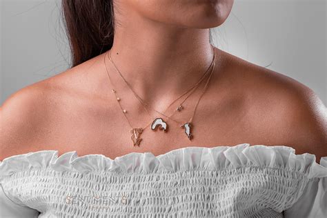 Social workers have opened a 'helpdesk' to assist hundreds of stranded expatriate workers unable to cross the king fahad. Bahrain Map Pearls Necklace - Sentiments Jewellery