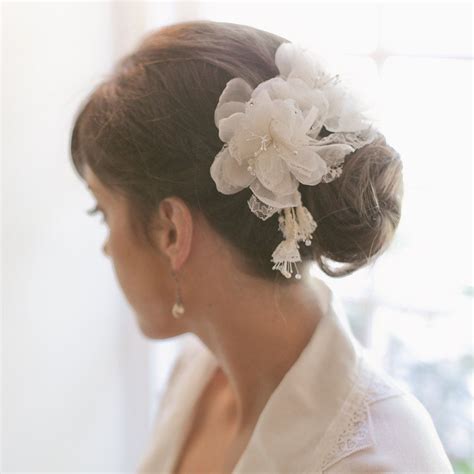 Sometimes referred to as boutonnières, they are usually worn by the men in the bridal party: Bridal silk flower hair pins - Sheer silk organza ...