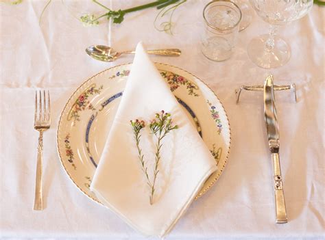 Soup is served in a heated soup dish, atop a dinner plate, and eaten with the soup spoon, which is placed at the outer right. Simple and Elegant table setting. Note the knife rest ...