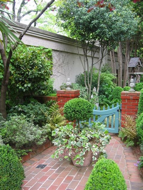 The term 'courtyard garden' conjures up visions of stately containers, architectural balance and cool, shady corners. Courtyard Garden With Gate comes with Brick Pathway and ...