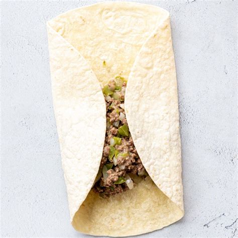 It was my first time having them and they instantly became my food obsession for the next few months. Philly Cheese Steak Wrap - Momsdish in 2020 | Steak wraps ...