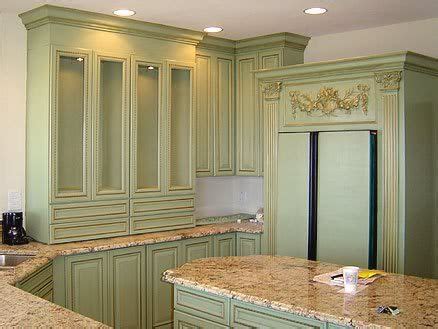 British designer matilda goad chose an unexpected backdrop for her kitchen cupboards, which are painted in sage green from little greene. Sage cabinets in kitchen? | Antique kitchen cabinets ...