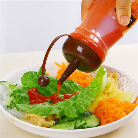 The deluxe squeezo comes complete with a standard screen, wooden plunger, brush and recipe. 20.5 x 6cm salad Storage Packing bottle sauce jam spices ...