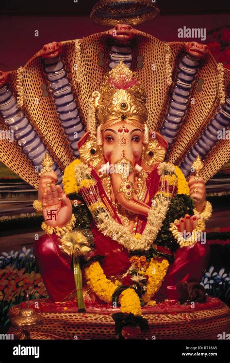 Statue Of Lord Ganesh Sitting On Elephant Hi Res Stock Photography And