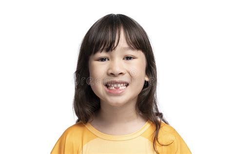 Cute Asian Girl Smiling Showing Her Missing Teeth In Her Mouthtooth Loss By Age Concept Stock