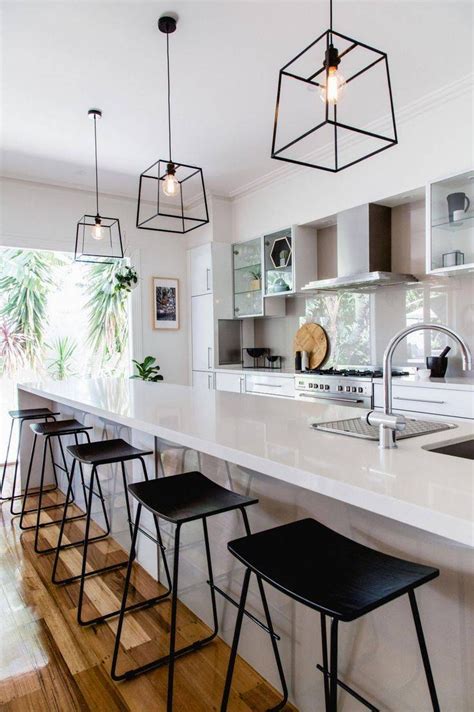This kitchen pendant boasts an led light source that lays flat and looks so modern hanging over your counter bar. The Best Single Pendant Lights for Kitchen Island