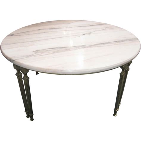 Opens in a new tab. Round Marble Top Coffee Table with Bronze Supports at 1stdibs