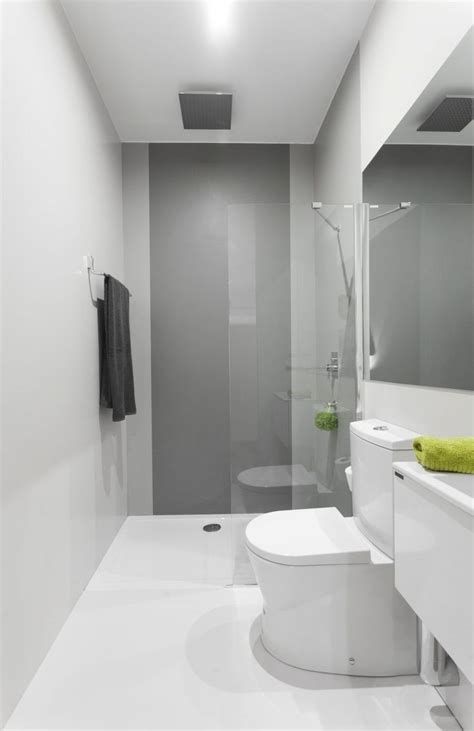 An ensuite bathroom should be a perfect bathroom if you can give an accent idea on it using black and white colors with the tiles, the shower, and even the mirror frame. Narrow ensuite | Narrow bathroom designs, Small narrow ...