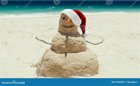 A Beach Sand Man Sculpture Wishes A Merry Christmas Stock Image Image