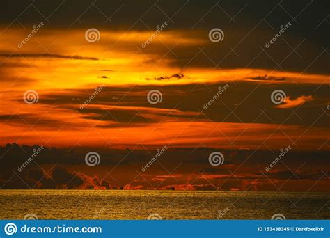 Sunset On Sea And Ocean Last Light Red Sky Silhouette Cloud Stock Image