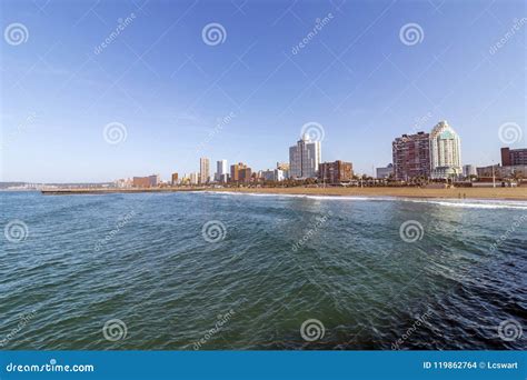 Ocean And Beach Against City Skyline Durban South Africa Stock Photo