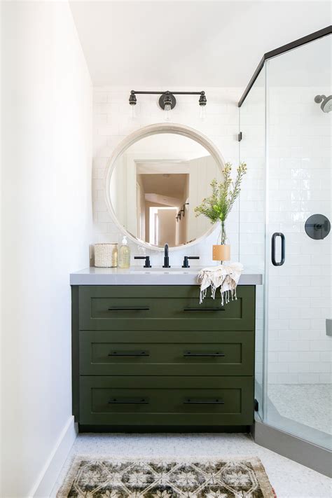 Dark, bold colours such as forest green make a modern statement. https://www.brookewagnerdesign.com/peninsula-ii in 2020 | Green bathroom, Bathroom design, Dark ...