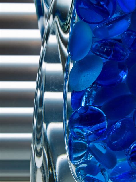 Beads In Vase Blue Glass Beads In Curved Glass Vase Permis Flickr