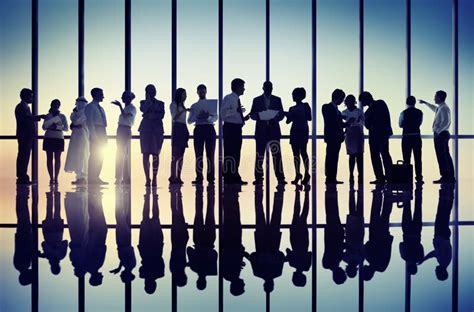 Silhouettes Of Business People Working Together Stock Photo Image Of