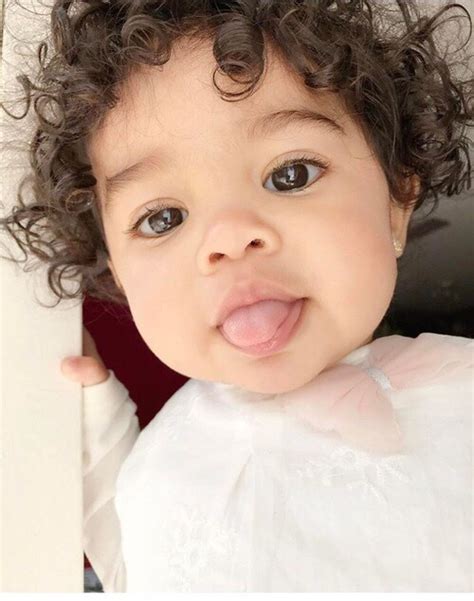 Baby curly hair routine space buns tutorial. brown hair baby | Tumblr