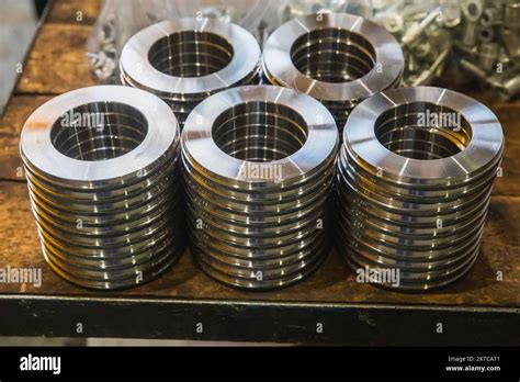 Round Metal Parts Made On A Lathe Stock Photo Alamy