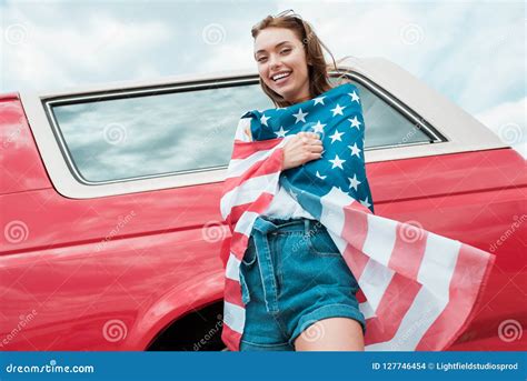 Cheerful Girl Wrapped In American Flag Standing Stock Photo Image Of Patriotism Vacation