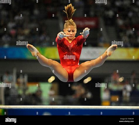 American Gymnast Shawn Johnson In Action On The Uneven Bars During The