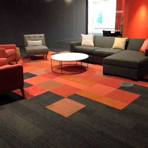 The texture of the office carpet will convey beautiful floor designs and trends. Graphite skinny plank & orange squares #gettheskinny #skinnyplanks #interfacecarpet | Carpet ...