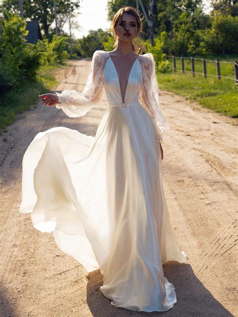 Explore stunning and affordable wedding dresses 2021. A-line wedding dress with lace bishop sleeves - Unique ...
