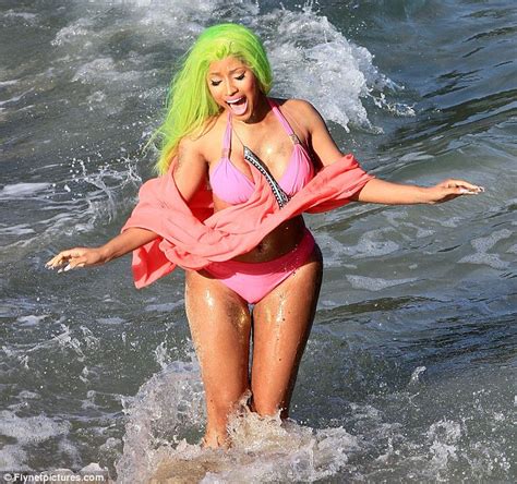 a bikini clad nicki minaj shows off her very shapely behind on the set of new video for