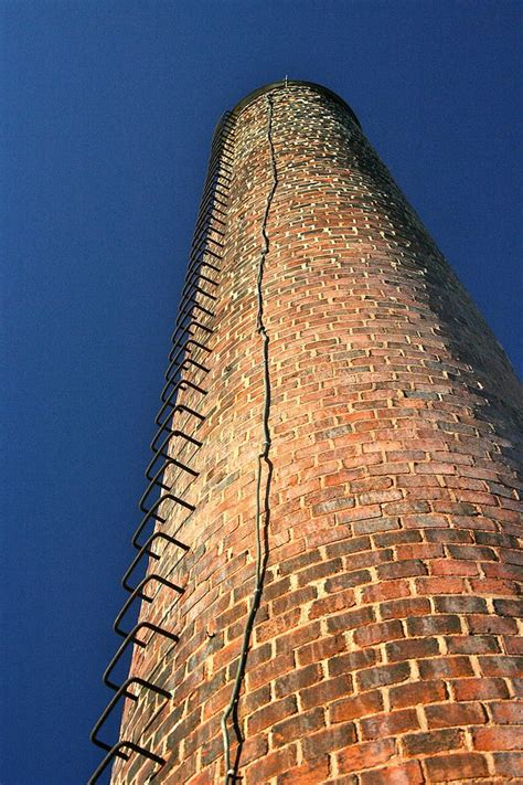 Brick Tower Photograph By Paula Deutz