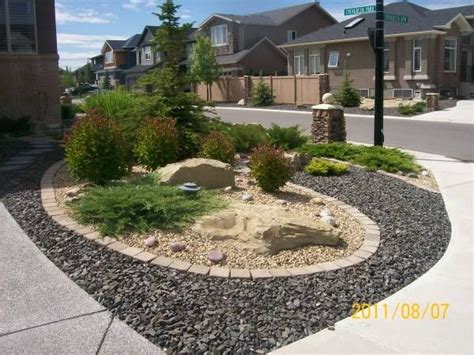 Driveway Landscaping For A Corner Lot Done With Xeriscaping
