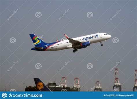 Airplane Taking Off From A Runway Editorial Stock Image