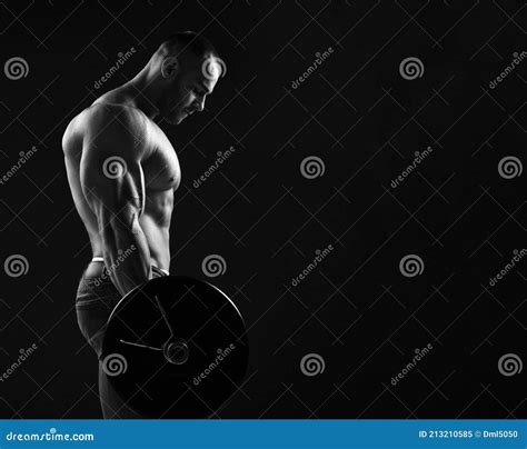 Strong Men Athlete Weightlifter Does Exercises Feeling Strong Tension