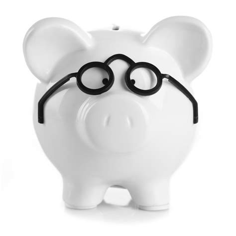 Premium Photo Piggy Bank In Glasses Isolated On White