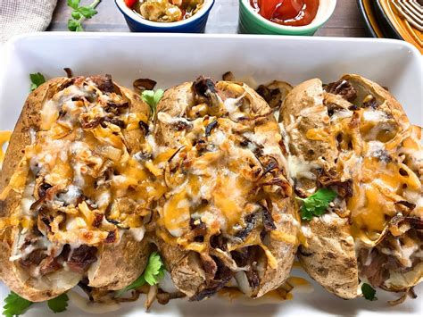 While the chicken fried steak is in the oven, place the gravy in a microwave safe dish and microwave for 2 minutes or until heated. Philly Cheesesteak Loaded Baked Potatoes