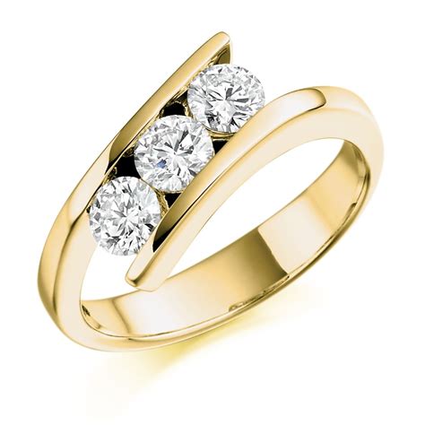Substantial 18 carat yellow gold vs diamond & ruby ring on twist. 18ct Yellow Gold 0.75ct Three Stone Diamond Ring